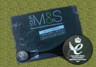 Marks and Spencer bag showing the Queen's Awards logo.