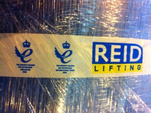 The Queen's Awards for Enterprise logo on a REID Lifting crate.